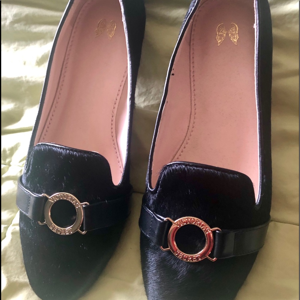 Size 7-1/2 slip on man made black fur shoes